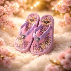 Breckelle’s Skull and Floral Flip Flops purple and pink size 9